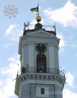 The trumpeter dressed in Ukrainian costume on the clock tower at noon